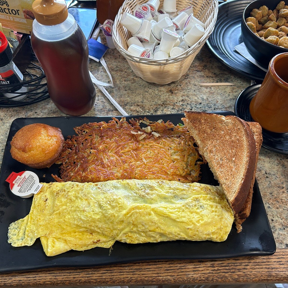 Woodsby's Cafe signature dishes Hungry ManBig EightCatfish Breakfast